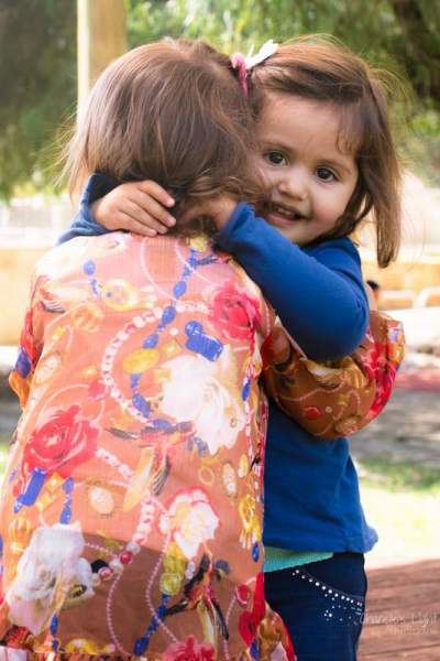 Hugs are what friends are made for and these two are superb at them!